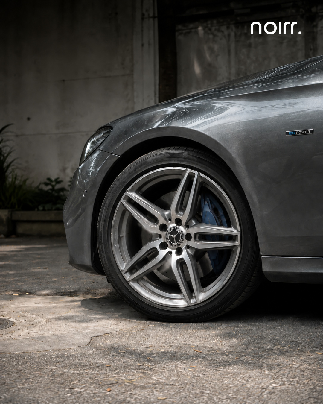 Intentional Mercedes wheel, tyre and blue brake caliper inspection detail
