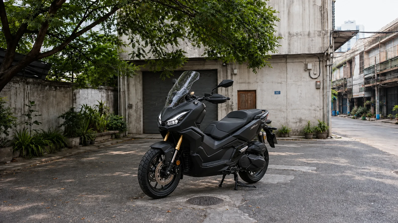 Honda ADV350 front three quarter in the Charoen Krung courtyard during daytime